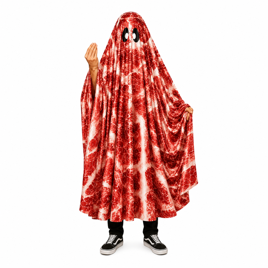 A person wearing a red and white marbled ghost costume blanket with cartoon eyes, standing against a plain white background.
